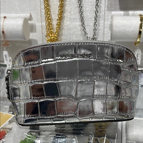 Michael Kors Handbags - Michael Kors Empire Sm Metallic Crocodile Embossed Leather Travel Pouch
Silver